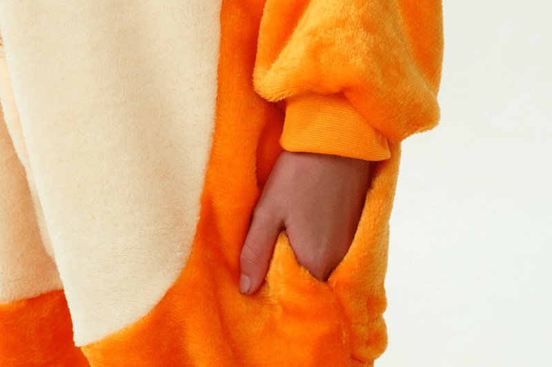 Close-up of Charmander Onesie For Kids showing soft fleece material quality and stitching